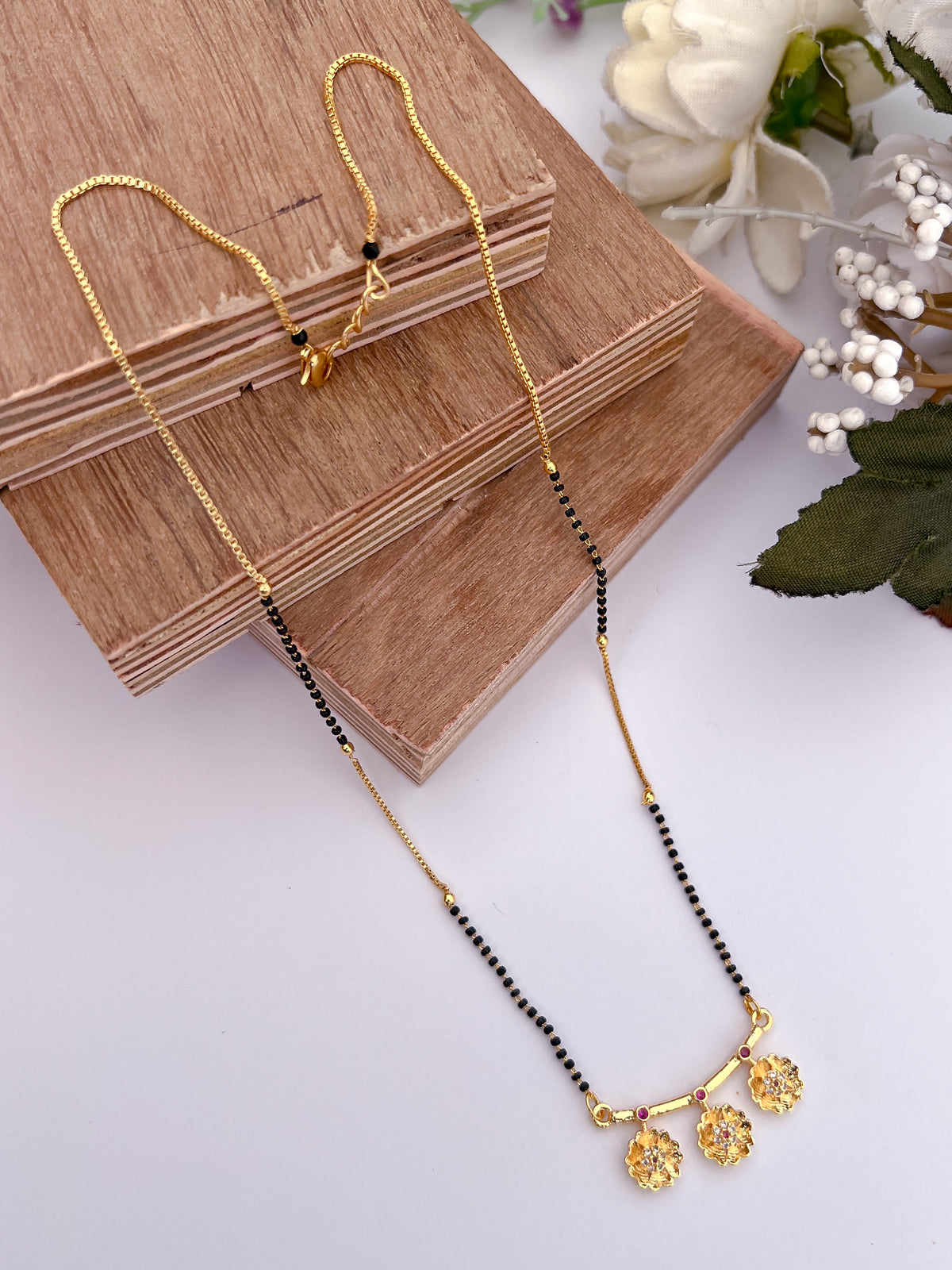 Floral Drop Black Bead Mangalsutra with Pink Stone Accents