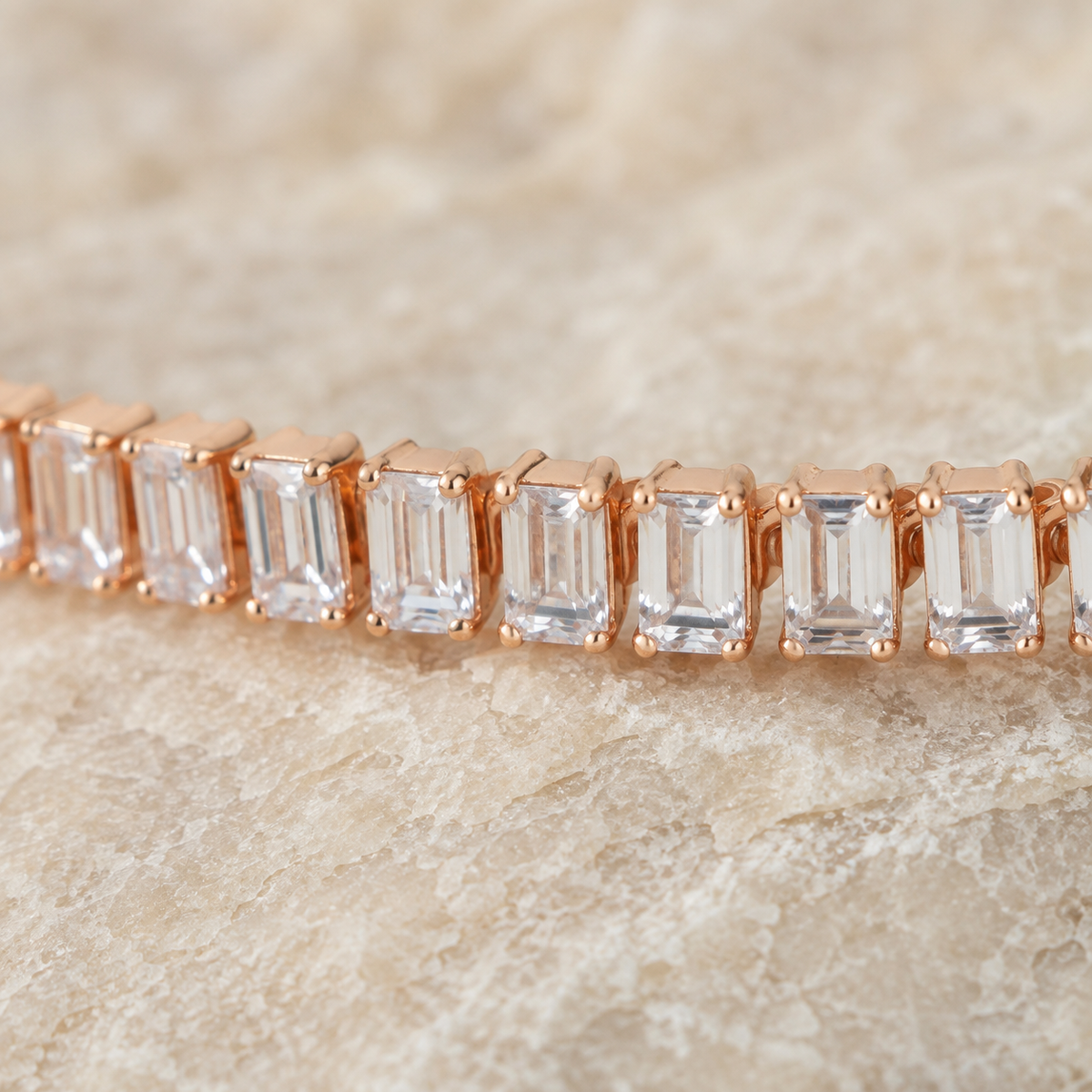 Close-up of baguette stones and rose gold settings