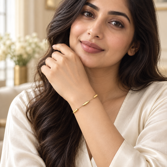 Sleek Bar Accent Gold-Tone Bracelet daytime model view