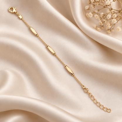 Sleek Bar Accent Gold-Tone Bracelet on ivory silk