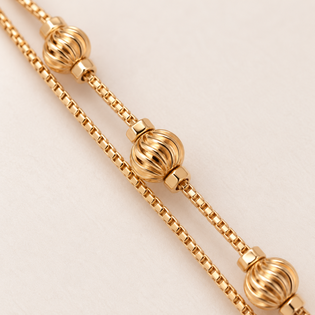 Golden Rosette Double-Chain Bracelet sculpted rosette detail